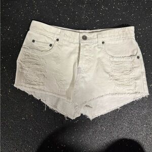 White ripped jean shorts